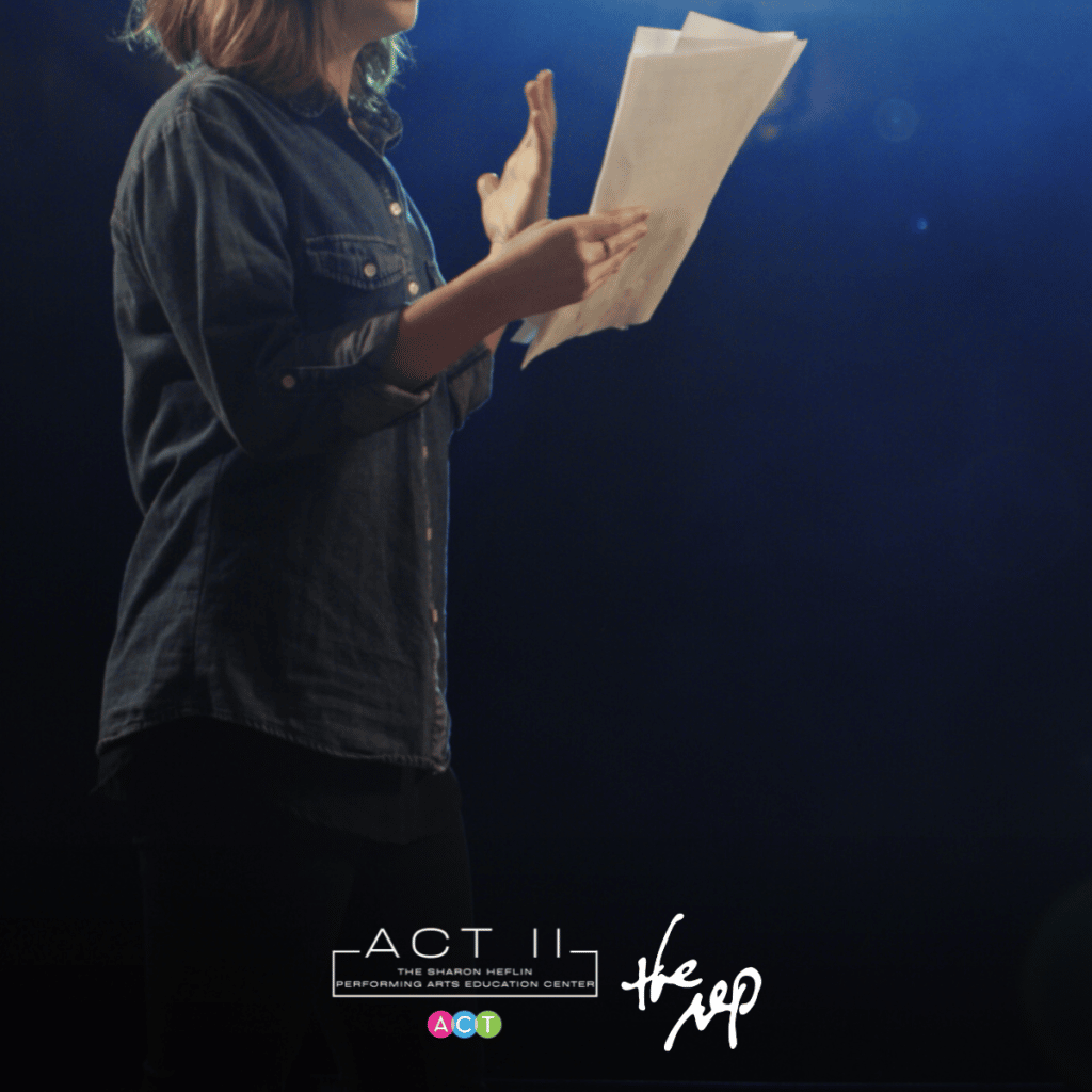 woman standing stage reading from a script, logos on the bottom for Argenta Community Theater and the Arkansas Repertory Theatre